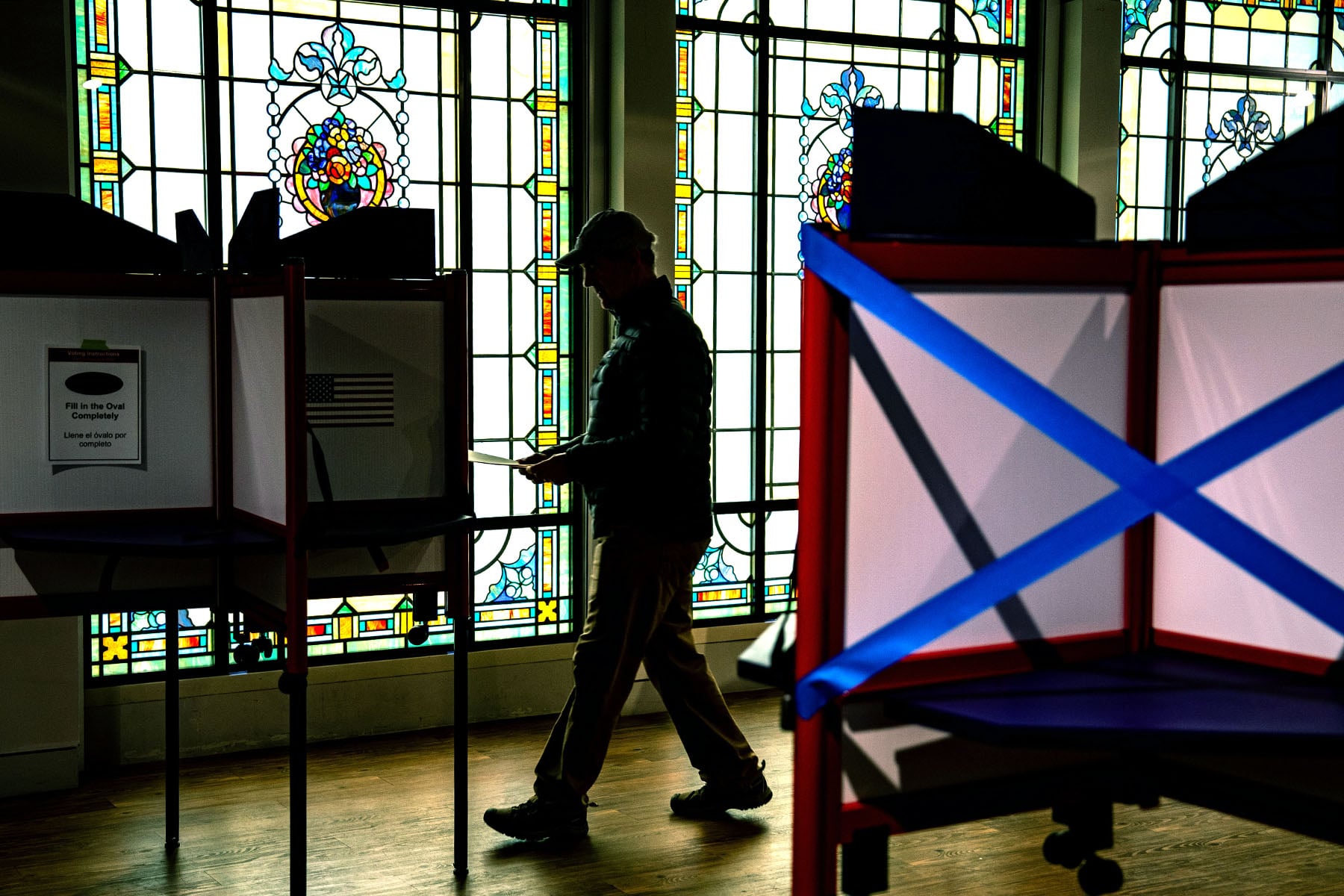 States move to restrict guns at voting sites amid threats against voters, workers