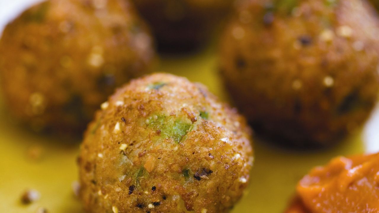 Black-Eyed Pea Fritters with Hot Pepper Sauce Recipe | Epicurious
