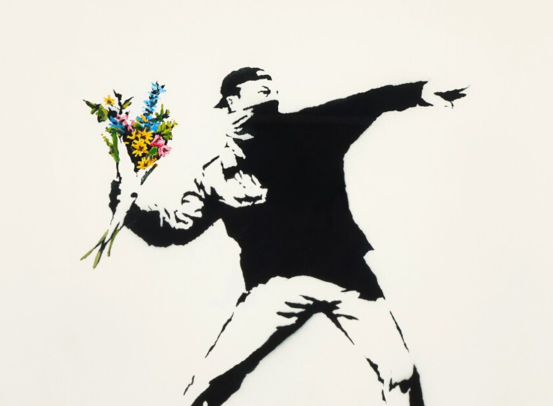 Love Is In The Air: Banksy's iconic symbol of peaceful protest - Banksy Explained
