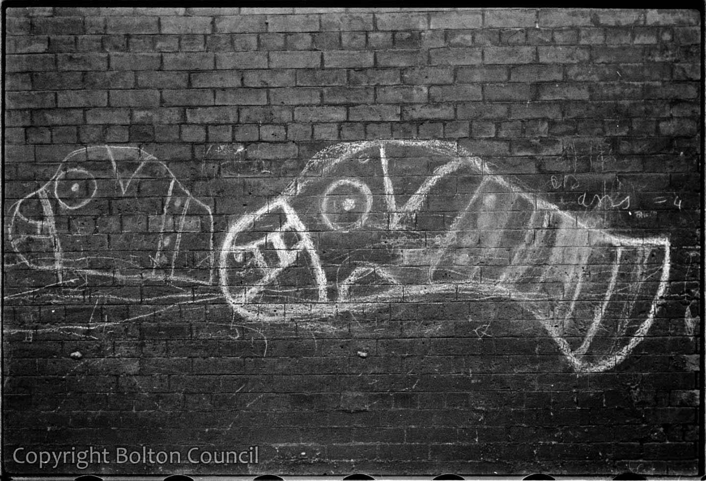 Graffiti- muzzled dogs by Humphrey Spender | Bolton Worktown