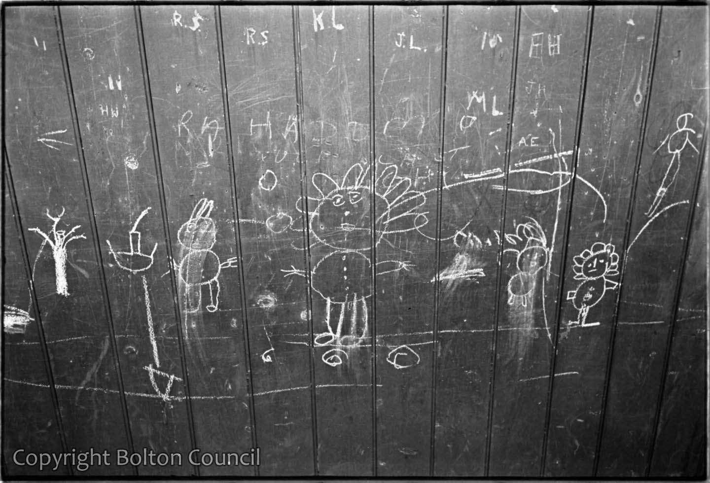 Graffiti on a railway bridge. by Humphrey Spender | Bolton Worktown