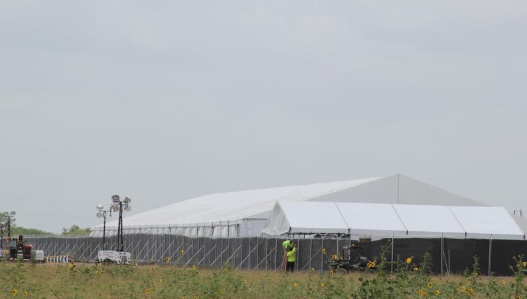 The Reality At The Border: Inside A New Migrant Tent Facility – Houston Public Media