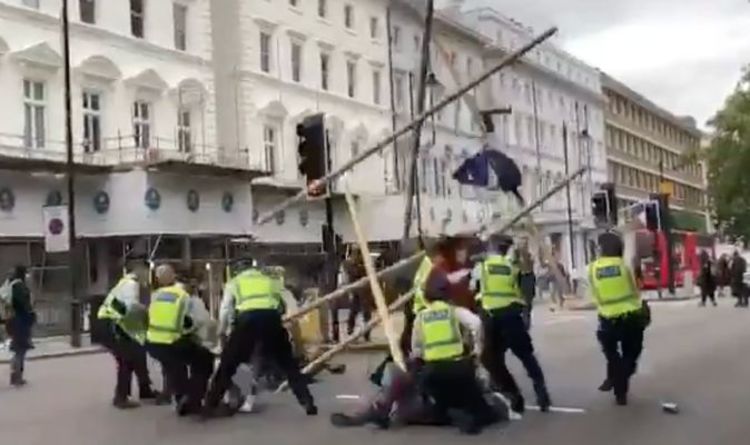 Extinction Rebellion: Chaos as police stop protesters blocking road | UK | News | Express.co.uk