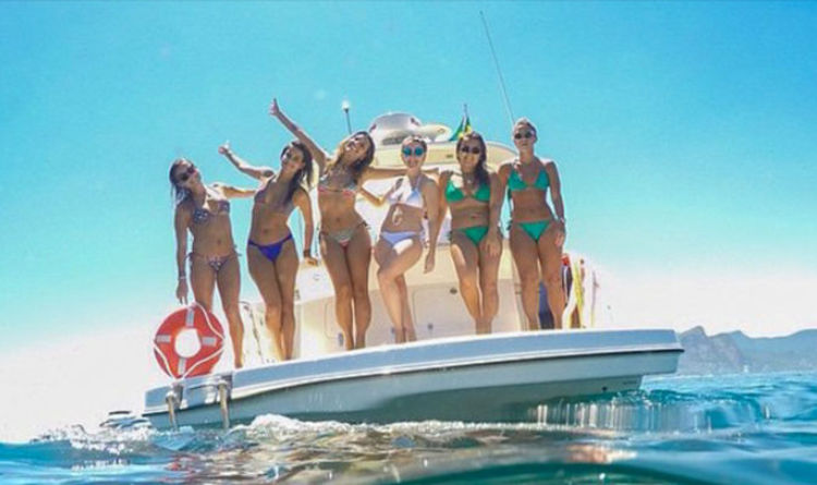 Best travel selfie EVER? Internet shocked by what lurks beneath this boat of bikini babes | Travel News | Travel | Express.co.uk