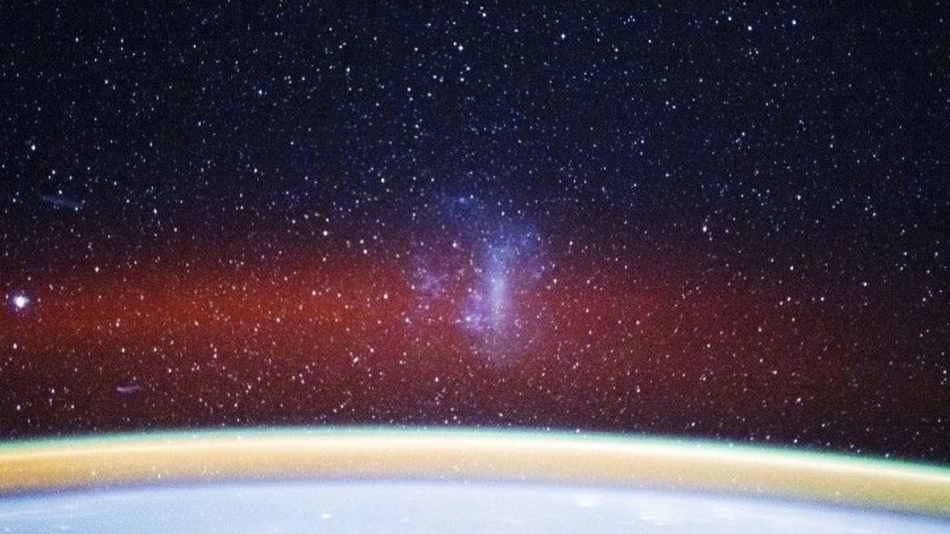 ISS astronauts spy airglow and dwarf galaxy photo of the day for Jan. 13, 2026 | Space