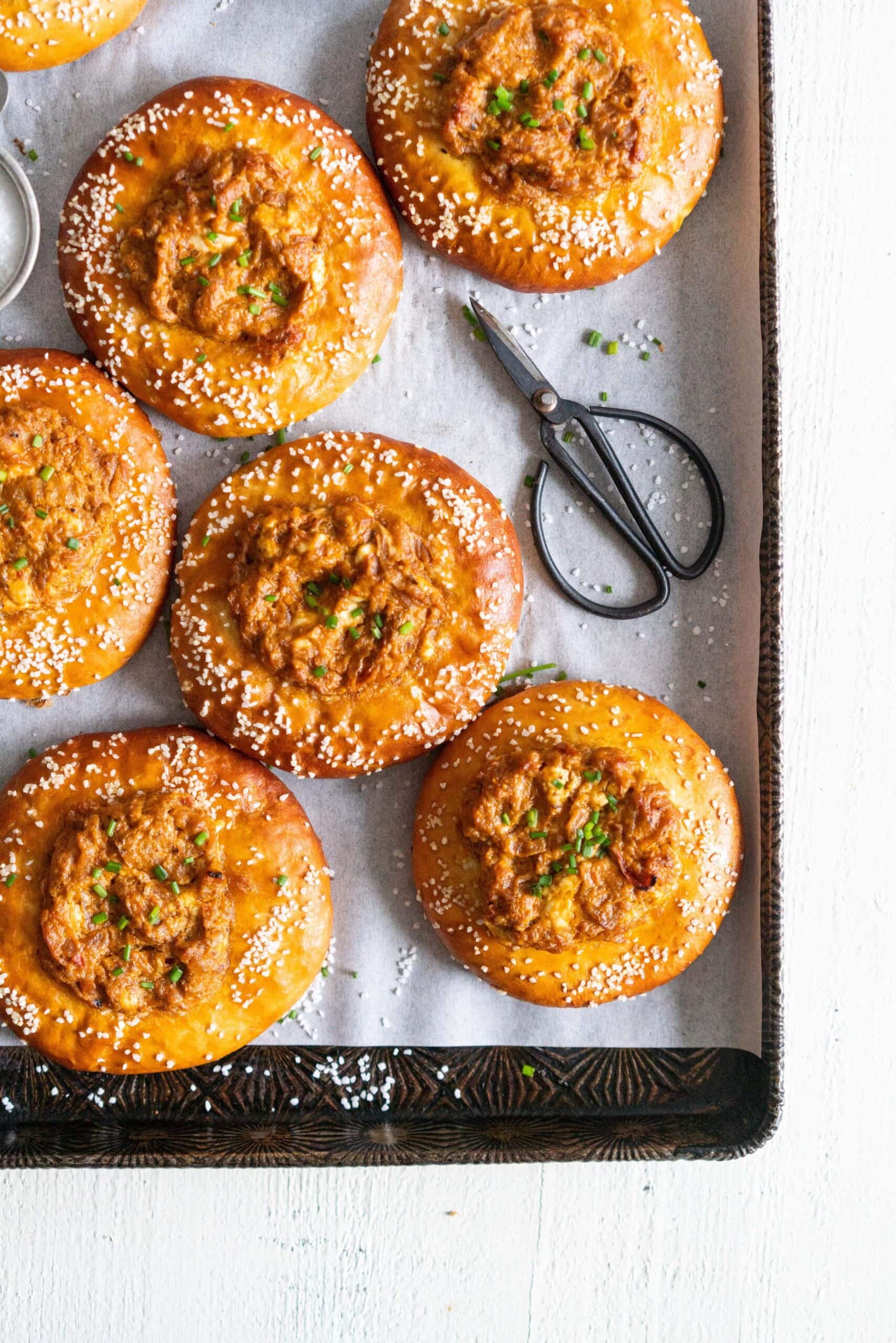 Caramelised Onion, Goat Cheese, and Sundried Tomato Pesto Pretzel Buns - Cloudy Kitchen