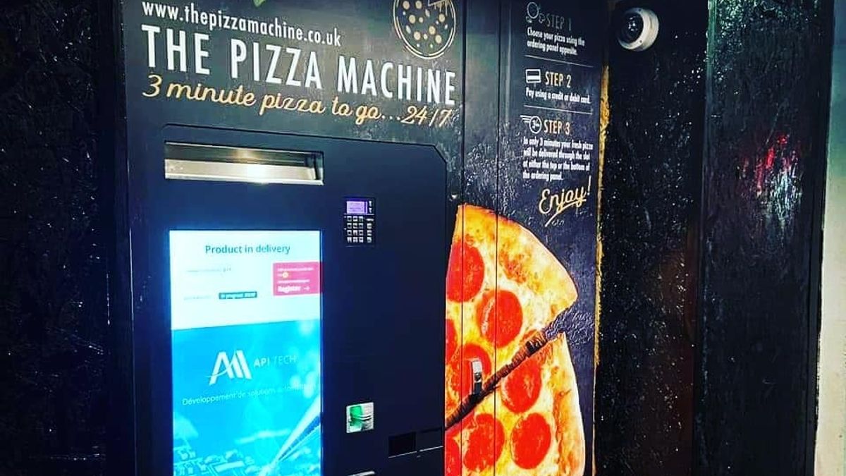 Man left flabbergasted by his £9 pizza after ordering from vending machine in wall - The Mirror