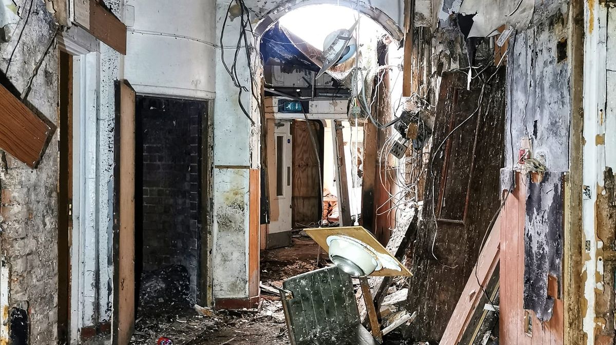 Inside abandoned gothic building with peeling walls and decaying rooms and toys - The Mirror