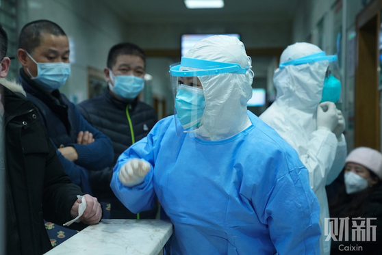 Reporter’s Notebook: On the Front Lines of Wuhan’s War Against Coronavirus - Caixin Global