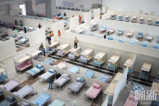 Update: Wuhan Struggles to Hospitalize Thousands of Coronavirus Patients - Caixin Global