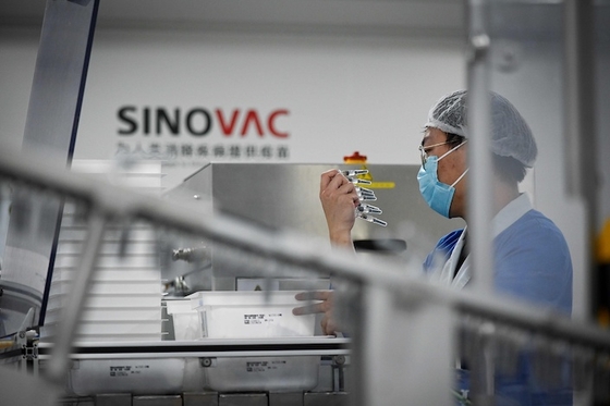 Sinovac Applies for Conditional Approval of Covid-19 Vaccine in China - Caixin Global