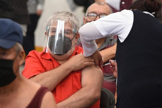 Why Seniors and Pregnant Women in China Can’t Get Vaccinated - Caixin Global