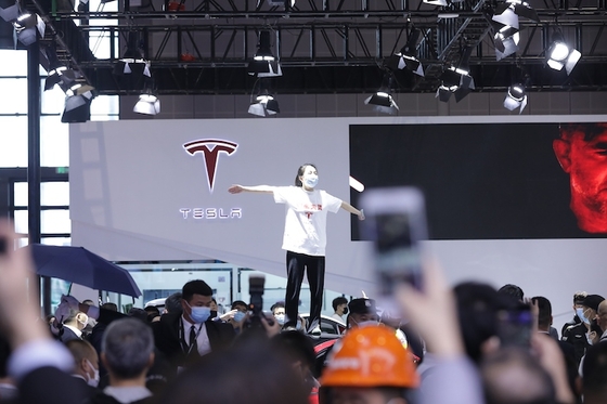 ‘Tesla Brakes Fail’: Shanghai Police Detain Auto Show Protestor - Caixin Global