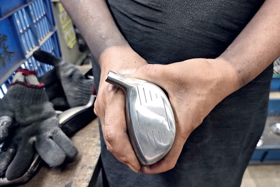 Golf Gear Factory Workers Get Raw Deal Over Vibration Syndrome Cases - Caixin Global