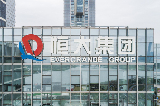 Evergrande Pays Back Paint Supplier in Property as Overdue Debt Piles Up - Caixin Global