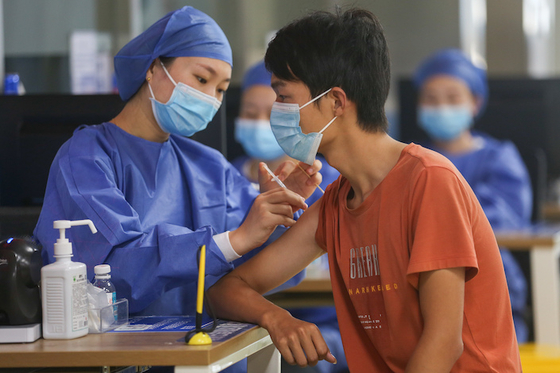 China Needs Better Home-Grown Vaccines to Beat Omicron, Expert Says - Caixin Global