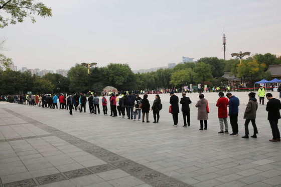 Authorities Scramble to Control Multiregion Covid Outbreak Linked to Infected Tourist Group - Caixin Global