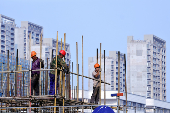 Chinese Developers Rush to Sell Shares Under Policy Easing - Caixin Global