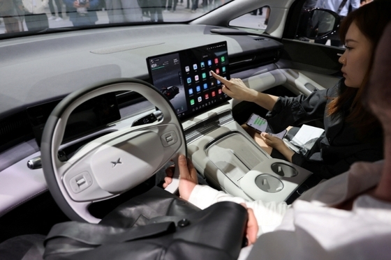 Chinese Carmakers Roll Out Self-Driving Car Insurance as Drivers Fret Over Liability - Caixin Global
