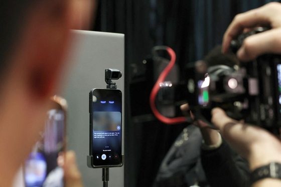 Chinese Tech Firms Dominate MWC Despite Mideast Travel Snags - Caixin Global