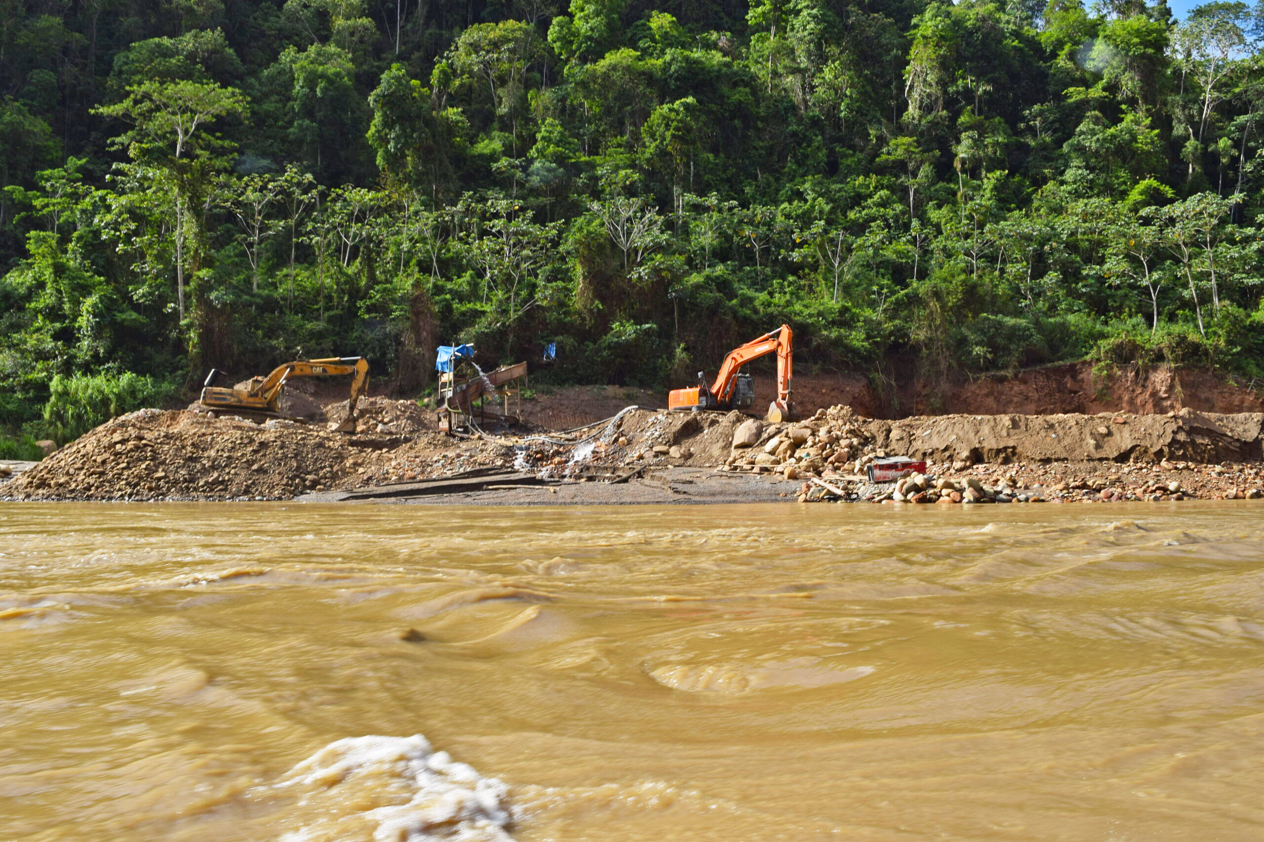 A national park and its rangers in Bolivia endure persisting road construction, illegal mining