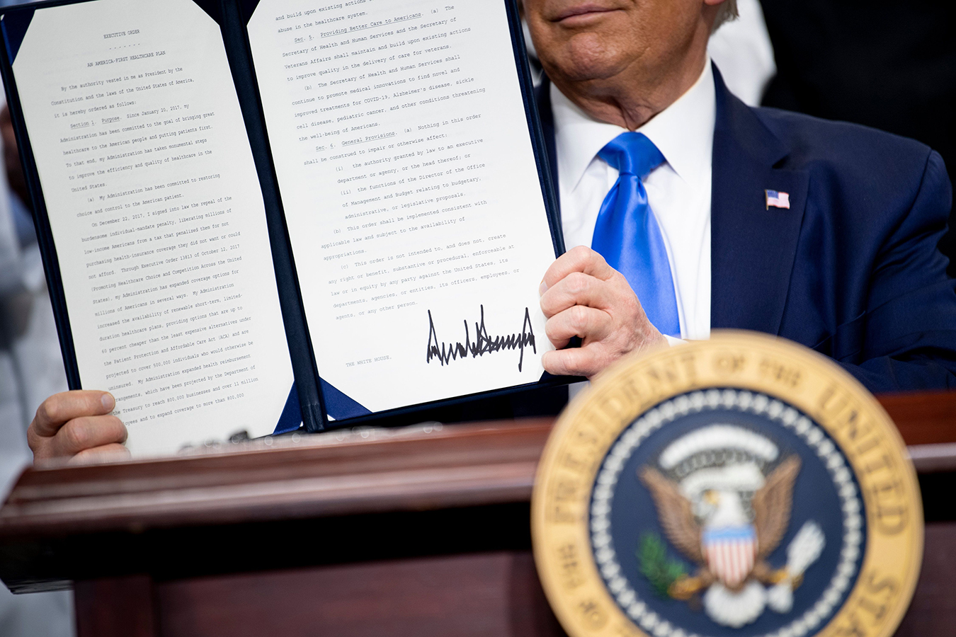 Trump’s Executive Order on Preexisting Conditions Lacks Teeth, Experts Say - KFF Health News