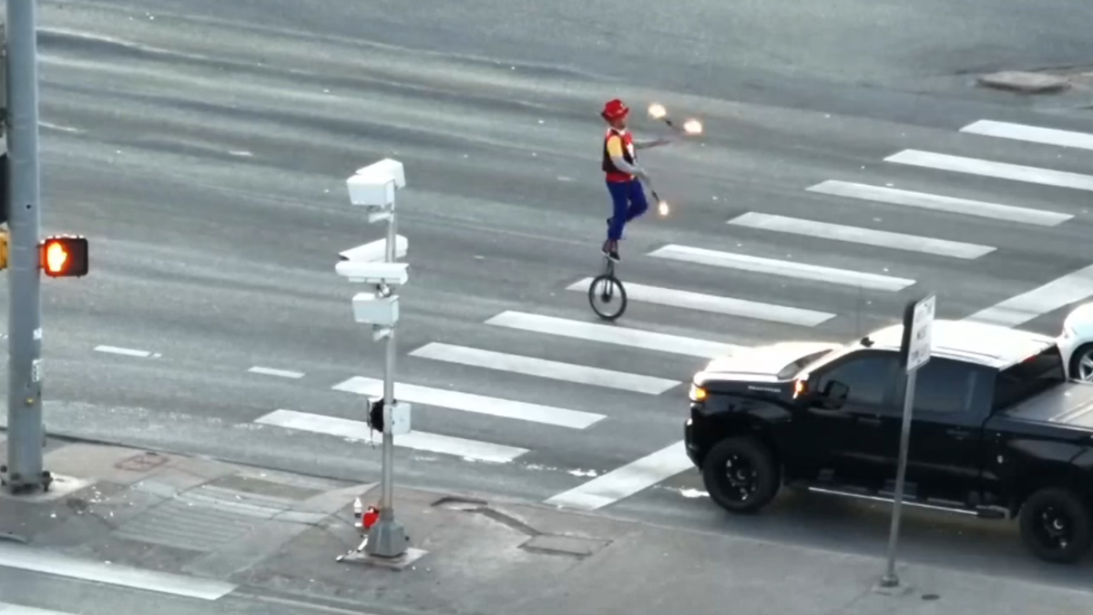 WATCH: Cops in Commerce City confront unicycling, fire-juggling clown in intersection | KRDO