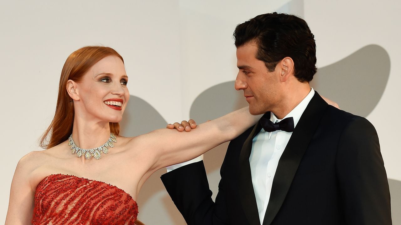 Oscar Isaac Gave a Bizarre Explanation For His Viral Red Carpet Moment With Jessica Chastain | Glamour