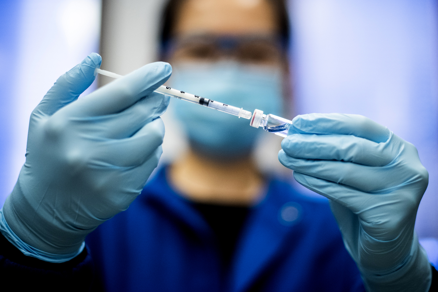 A COVID-19 vaccine won’t mean a swift end for wearing masks or physical distancing - Northeastern Global News