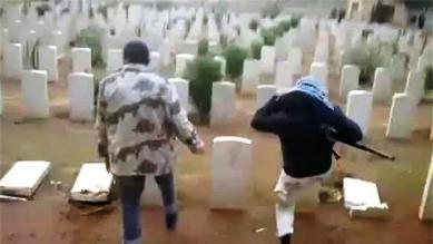 Islamic State 'Sledgehammers' Christian Gravestones and Crosses in Mosul