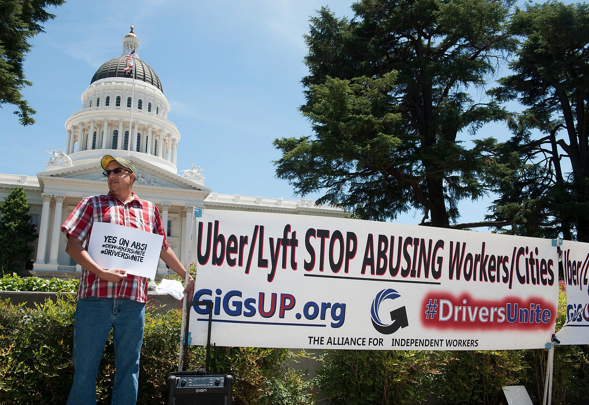 Gig-work bill passes Senate committee as crowds rally for and against it