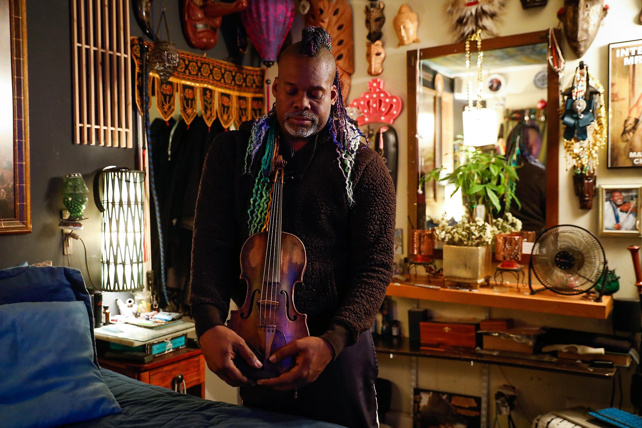 Violin provides SF man the key to harmonious life