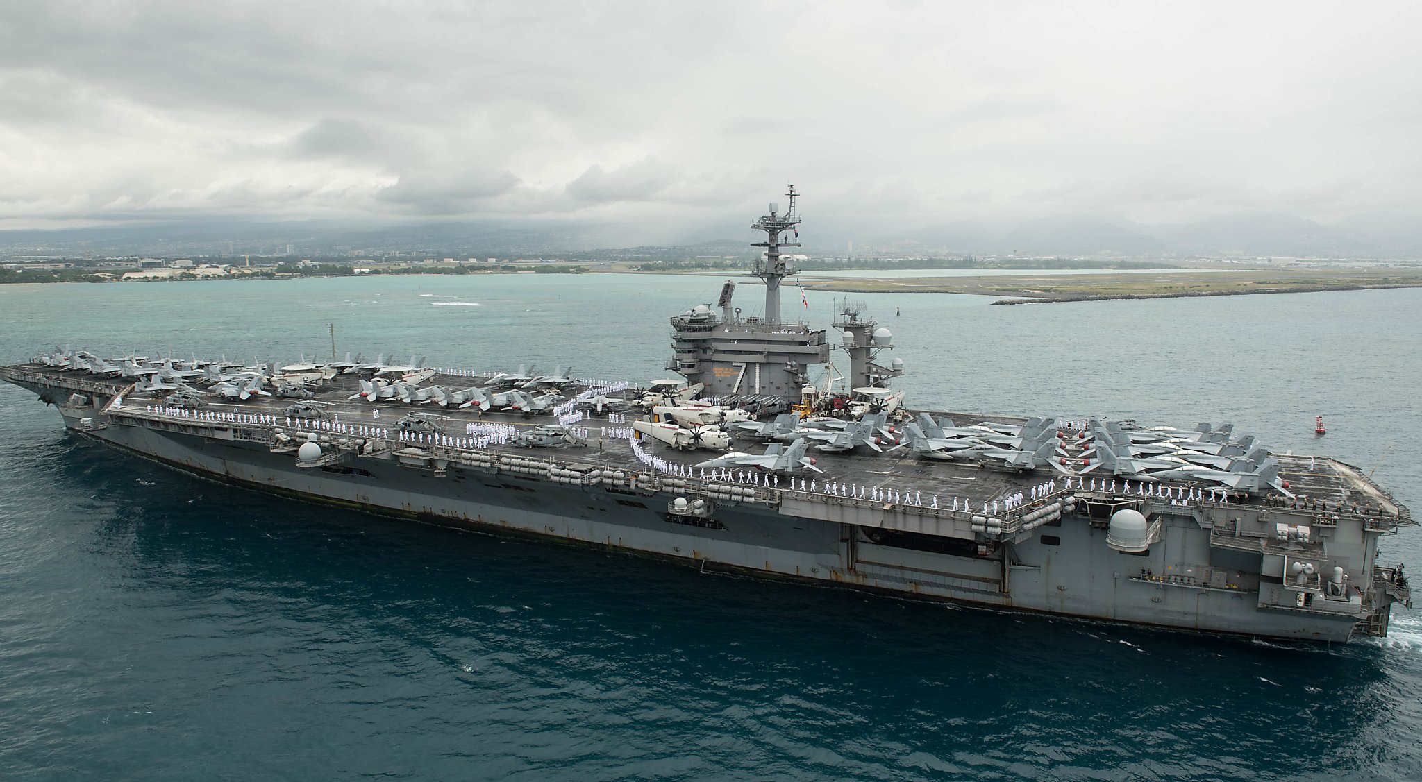 Exclusive: Captain of aircraft carrier with growing coronavirus outbreak pleads for help from Navy
