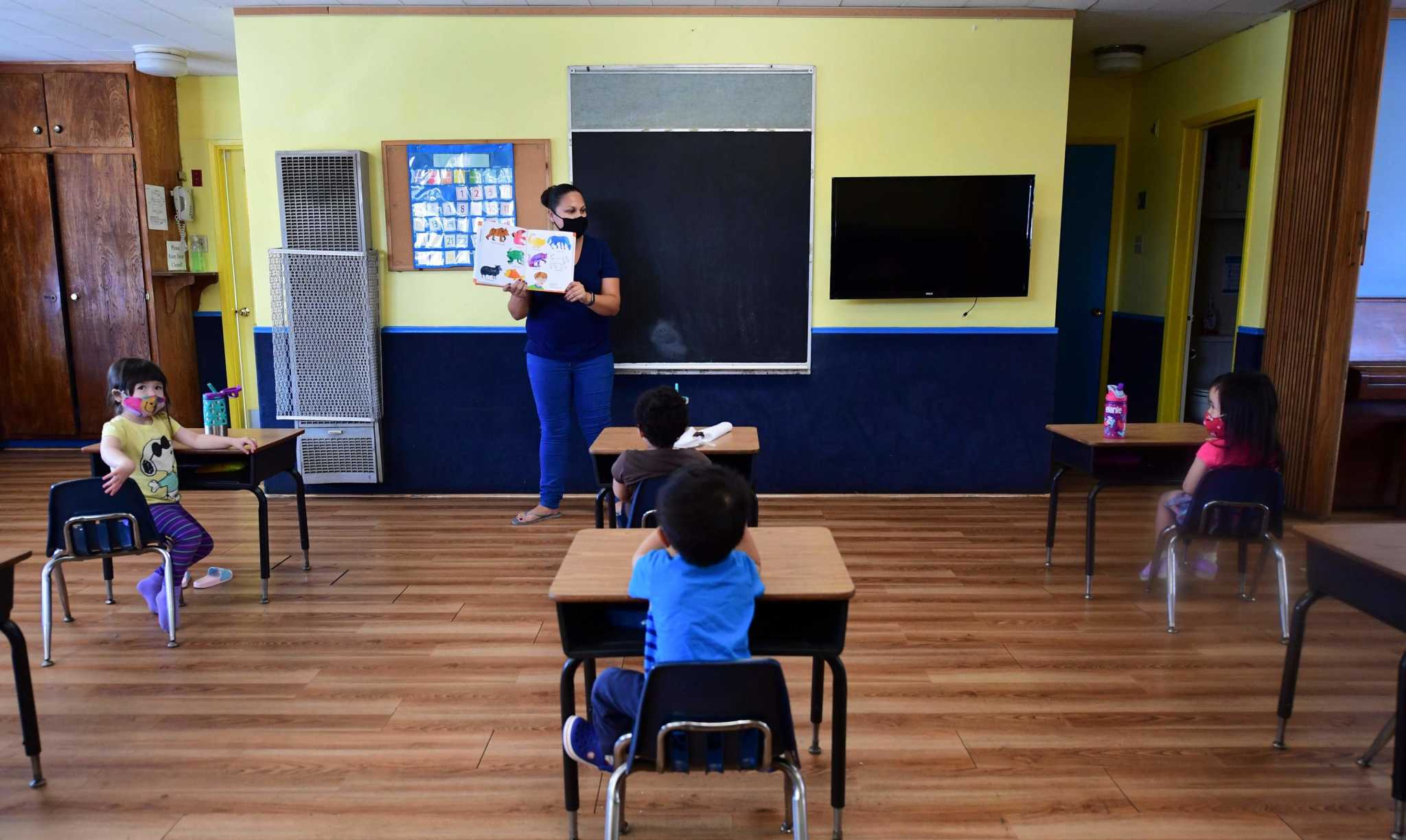 California keeps school mask mandate, as CDC lifts distancing requirement to encourage reopening