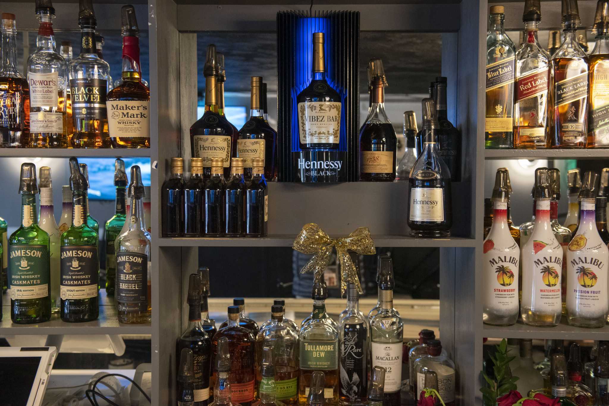 When Hennessy's not behind the bar, some see discrimination