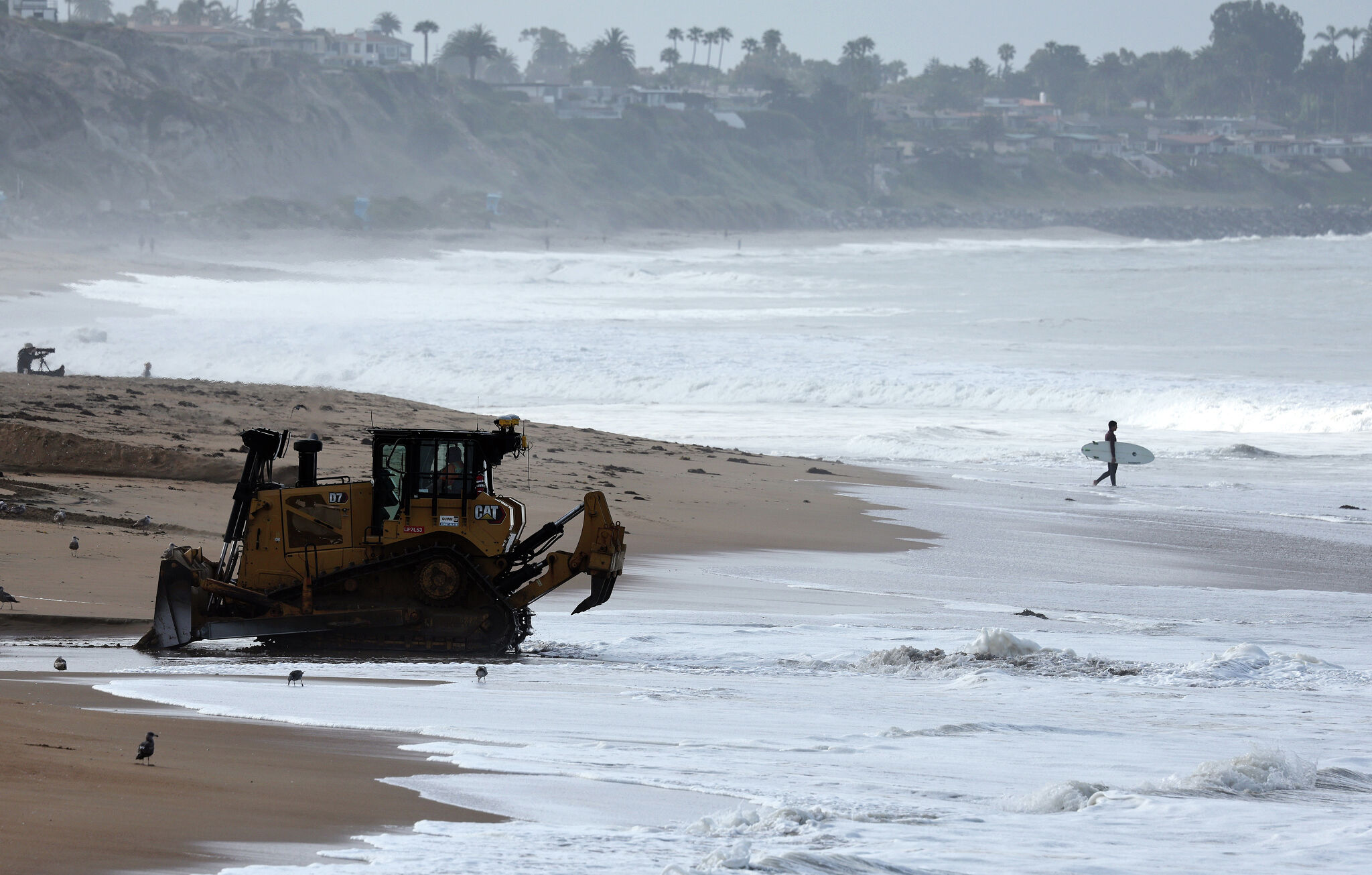 A wealthy Orange County city is spending big on sand. It may not work.