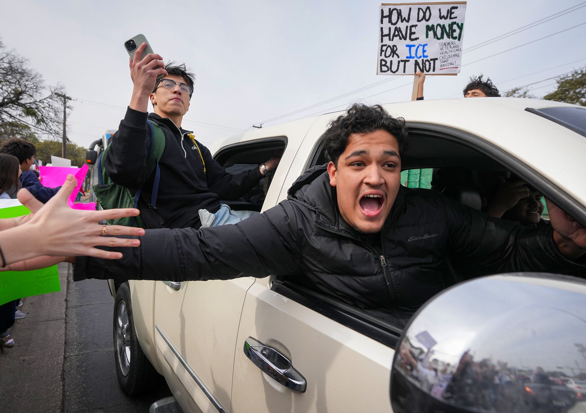 Photos: Austin businesses close, students walk out in anti-ICE protest