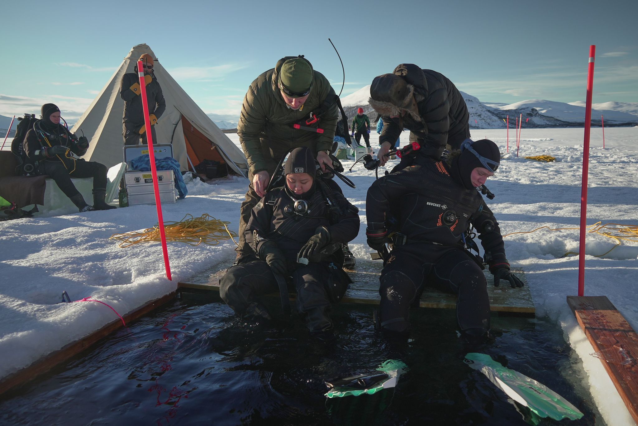 The sea beneath Arctic and Antarctic ice holds many secrets. These scientists dive deep to find out