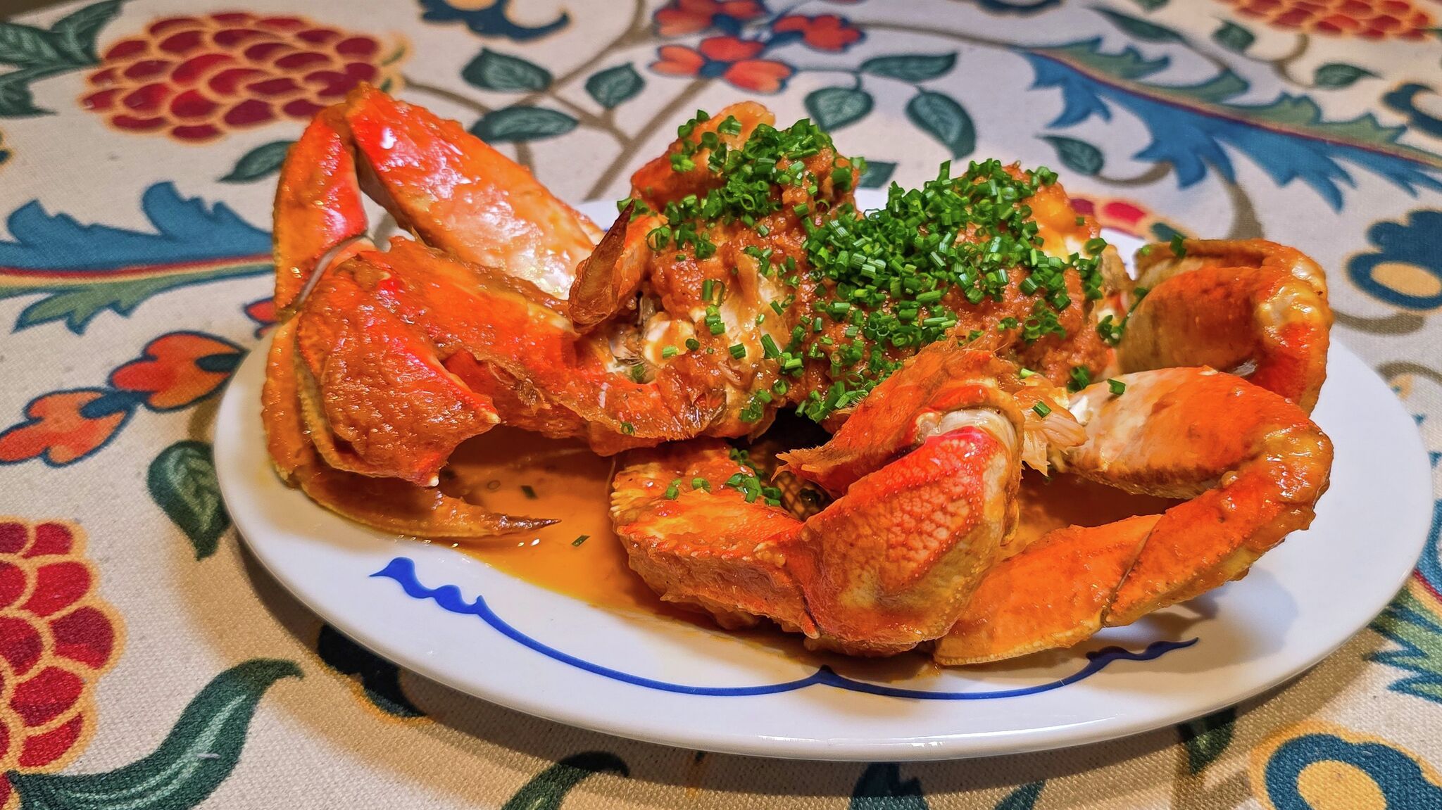 Before Dungeness disappears, bathe it in tomato-chile butter