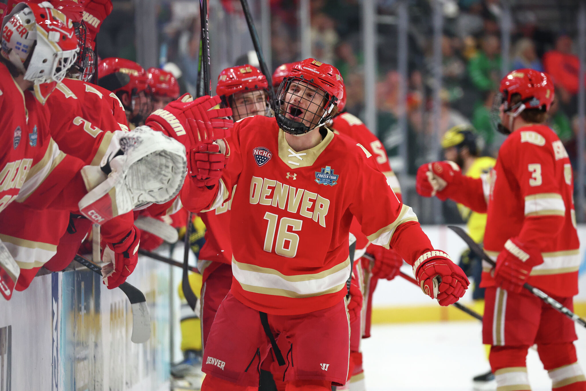 Denver, Wisconsin win Frozen Four games, to play for national title