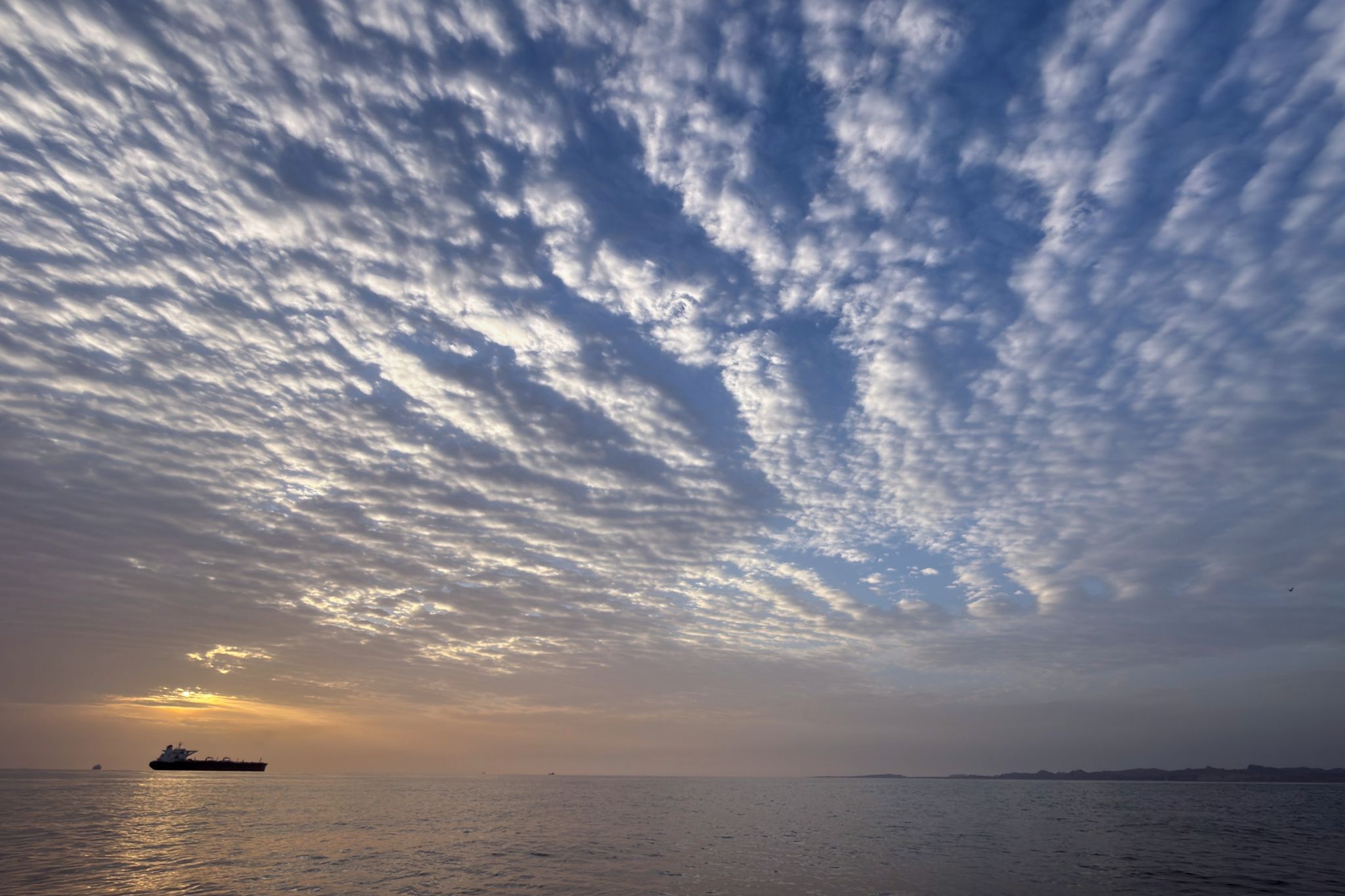 Iran fully closes Strait of Hormuz over US blockade and fires on ships