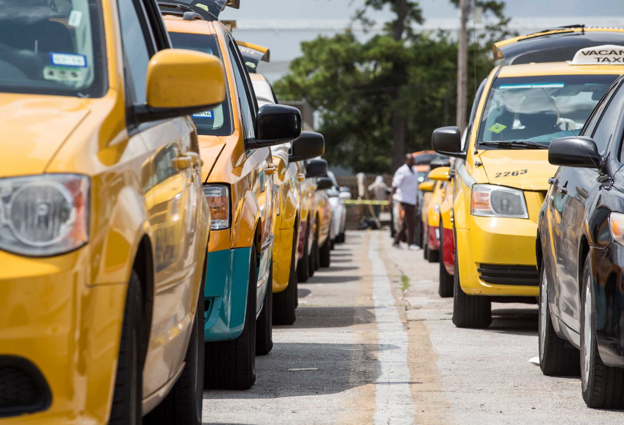 For taxi drivers, Uber's entry latest chapter in long struggle