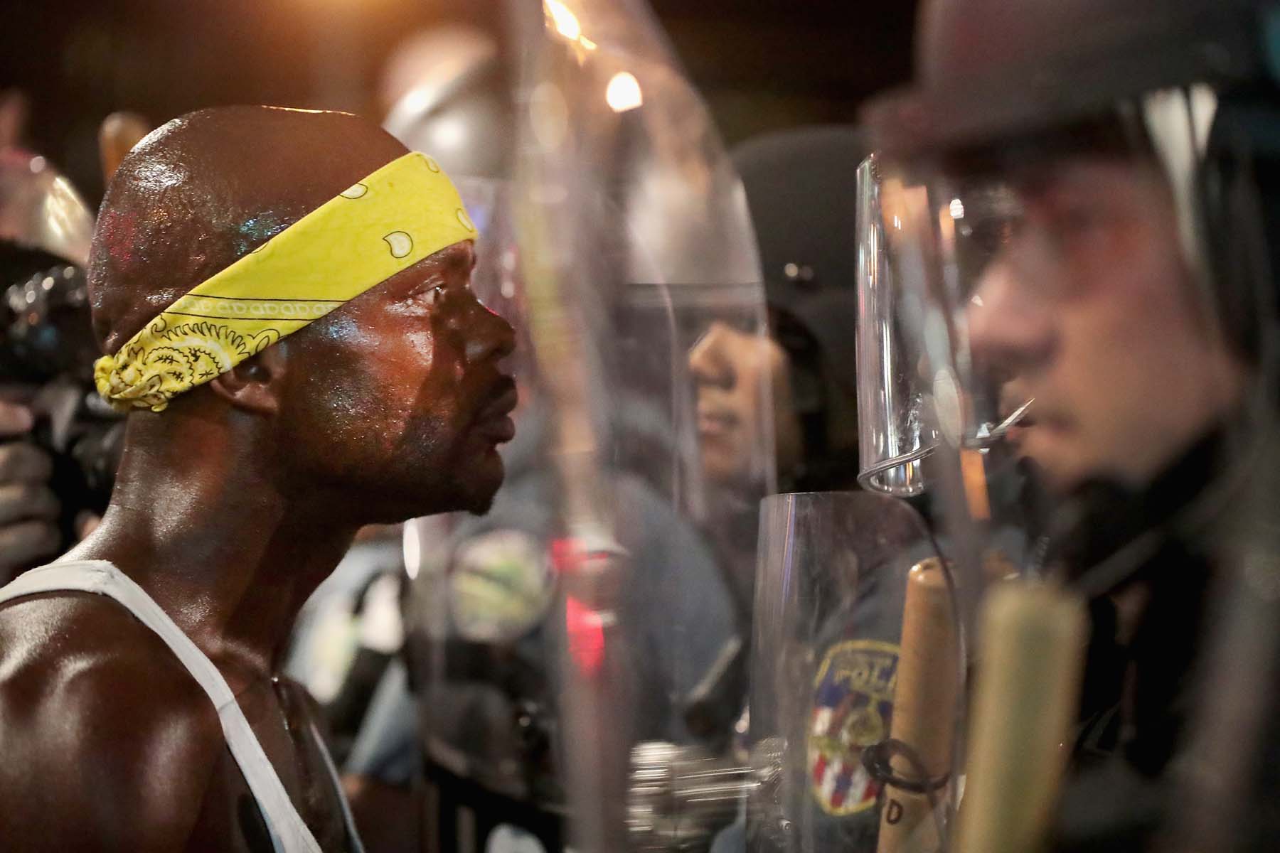 Protests resume after 80 arrests in St. Louis unrest