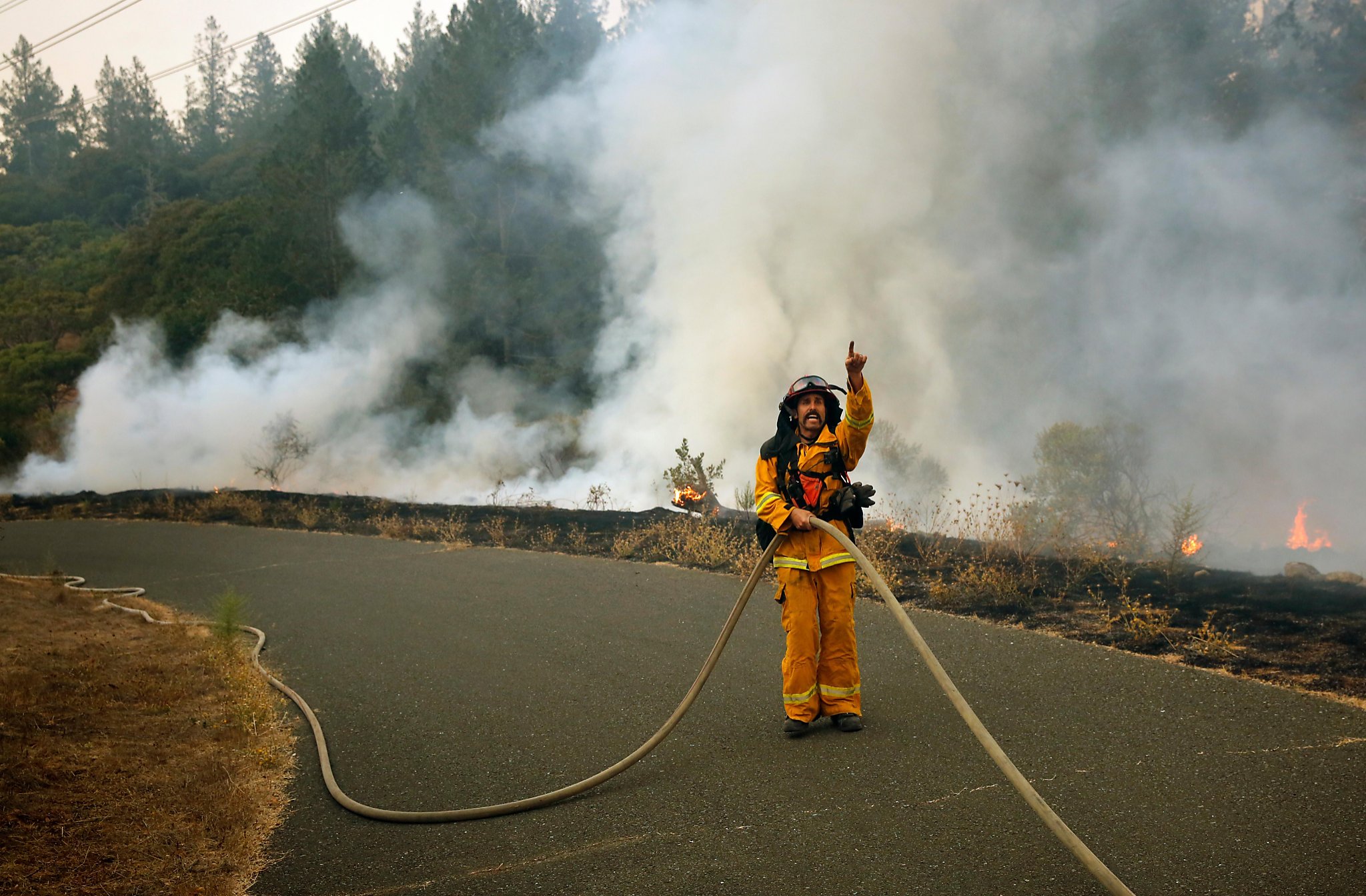 Geyserville residents defy evacuation orders as Wine Country fire threatens