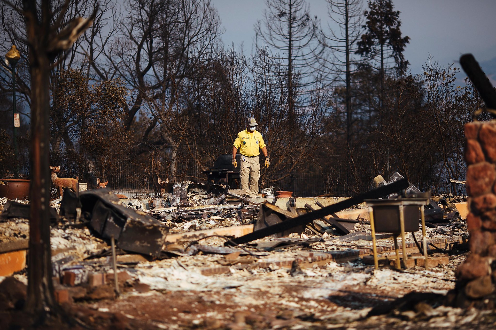 Searchers looking through the rubble after Wine Country fire