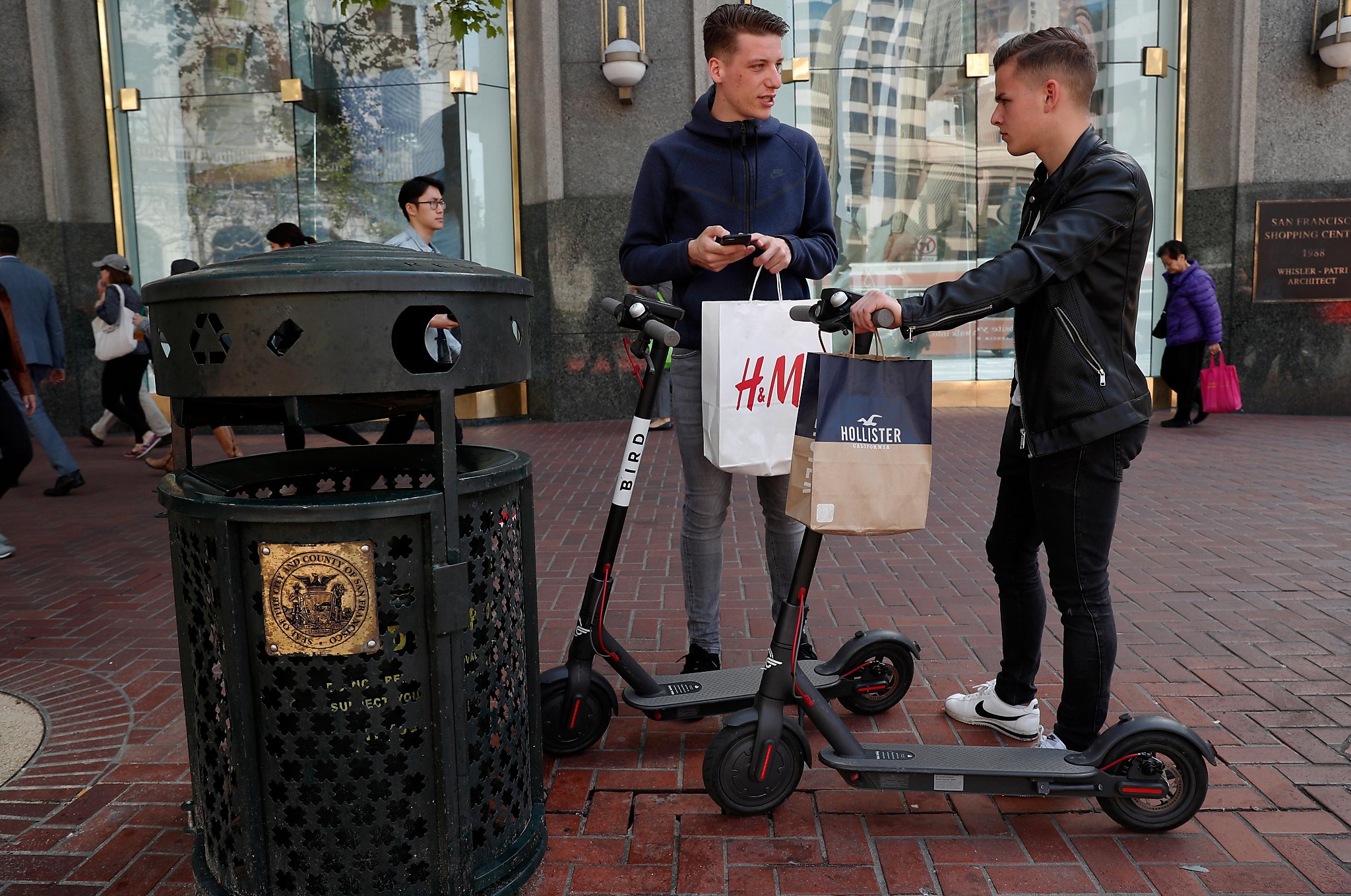 Rules in the works as city offers olive branch in scooter war