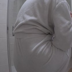 Blonde taking a shower