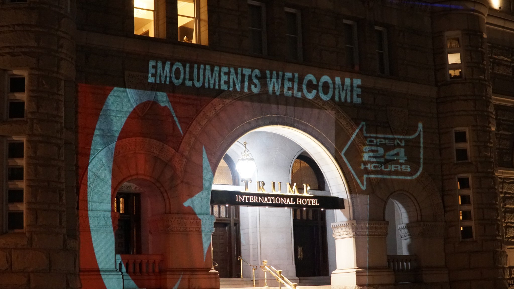 Protesters project hilarious messages over the entrance to Donald Trump's Washington DC hotel - Palmer Report