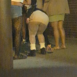 Night club ebony ass hanging of skirt