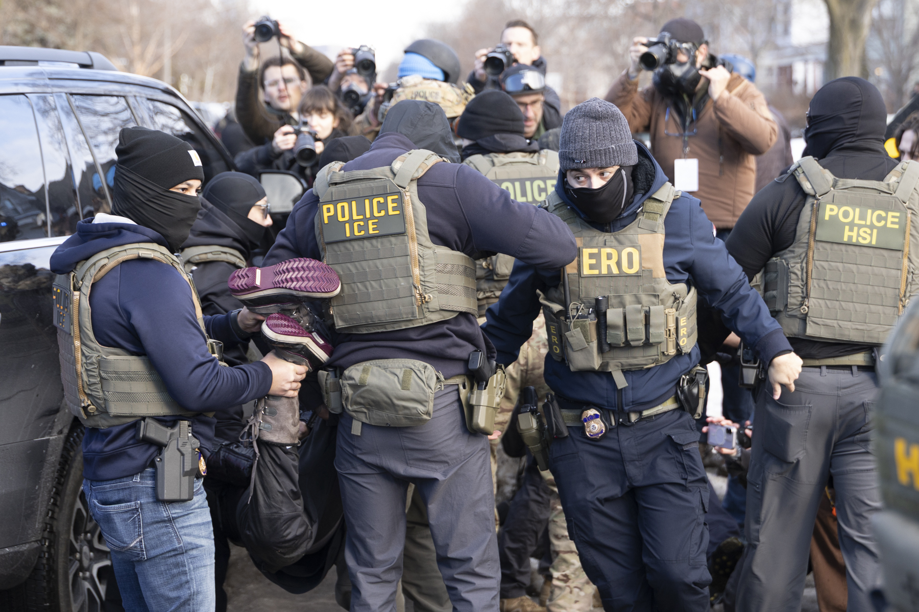 Crowd confronts immigration agents door-knocking in south Minneapolis